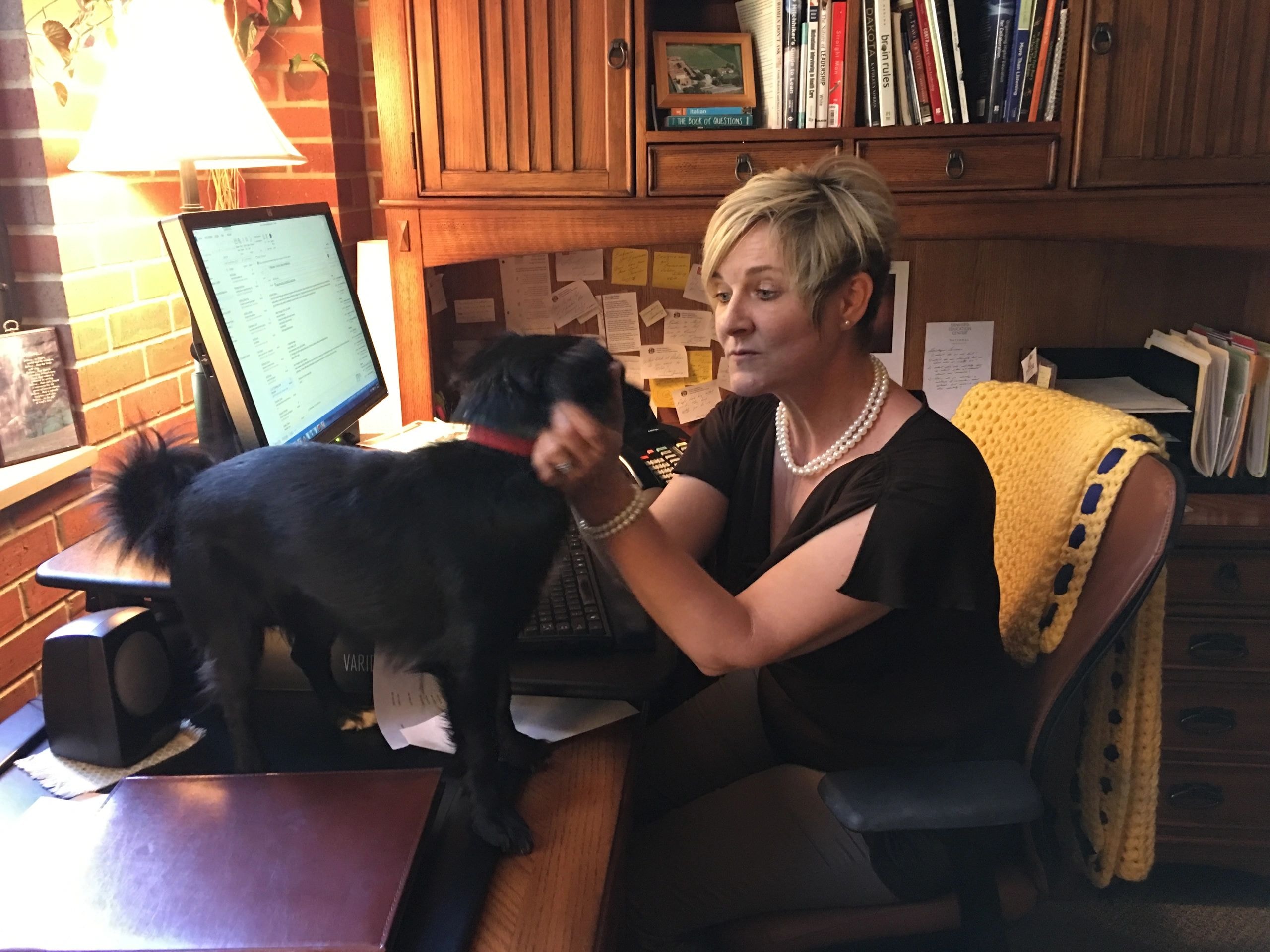Jill Thorngren with Tag at work